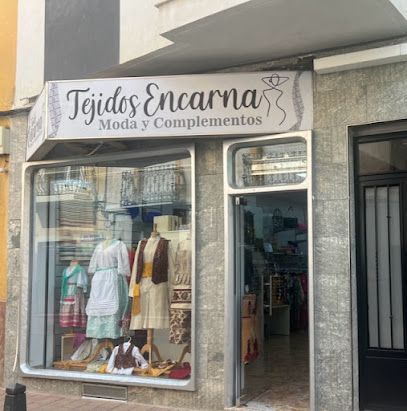 Tejidos y Modas Encarna. Especialidad en trajes regionales, semana santa, textiles y merceria.