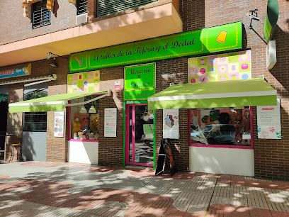 La Tijera y el Dedal